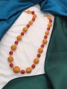 gold polish balls mala with red beads